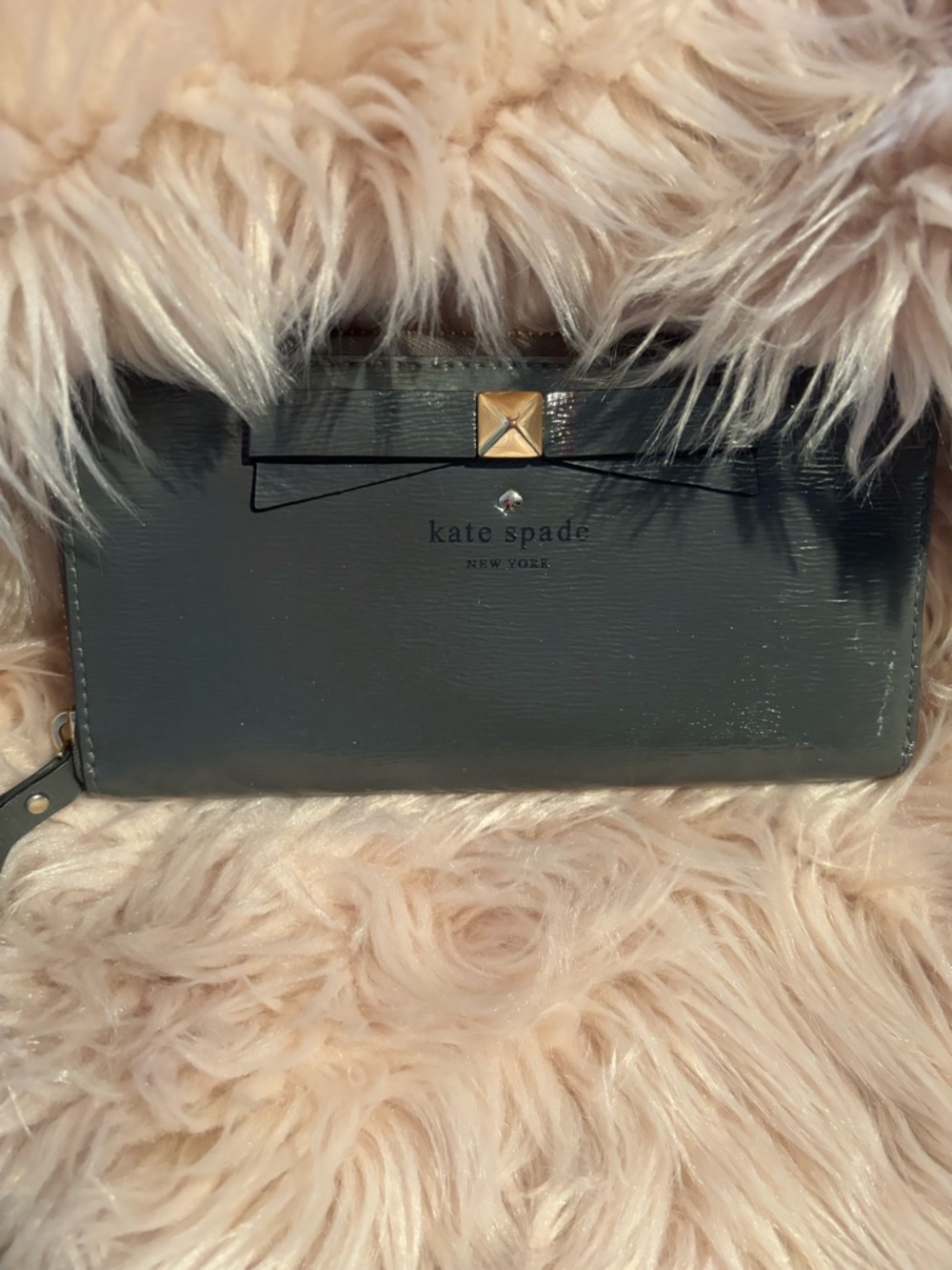 grey Kate Spade Beacon Court patent leather wallet